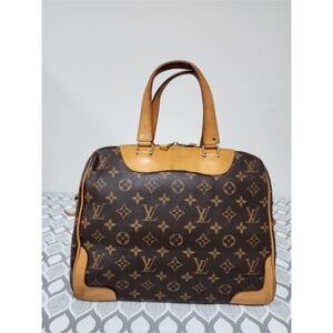 Authentic Louis Vuitton Monogram Canvas Retiro MM NM Bag
